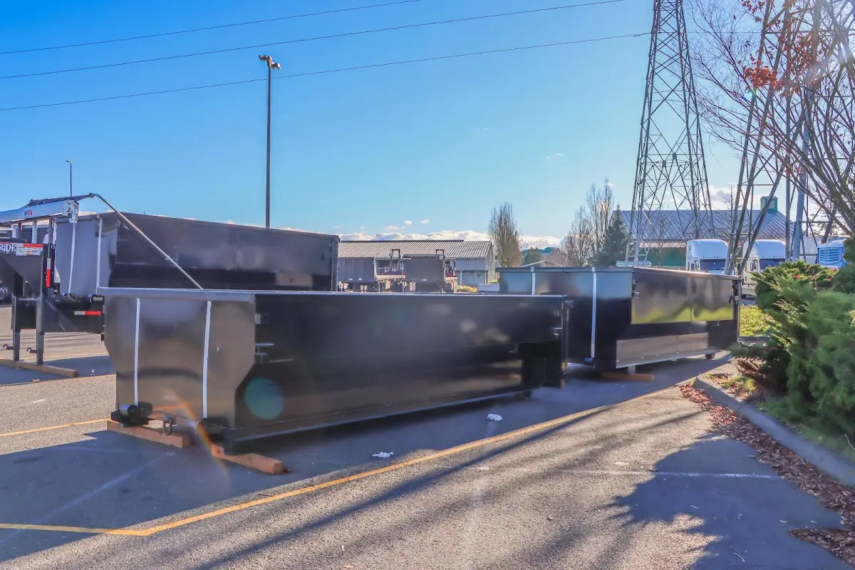Roll-off dumpster ready for waste disposal at job site for Construction Dumpster Rental in Charlestown